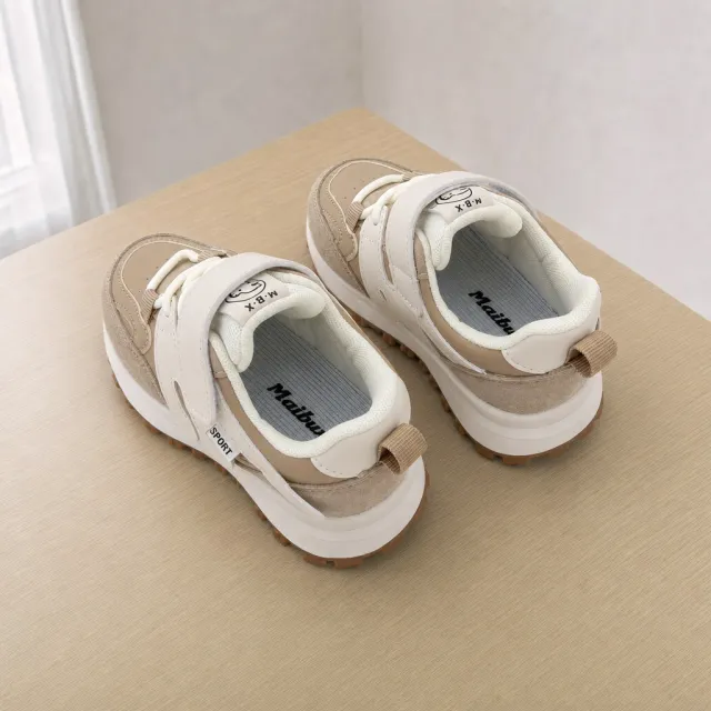 Toddler sneakers on a table, angle 3